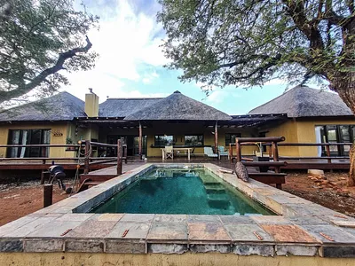 4 Bedroom House For Sale in Raptors View Wildlife Estate, Hoedspruit - LUHr.webp