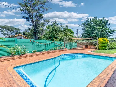 4 Bedroom House For Sale in Akasia - Z1Cw.webp